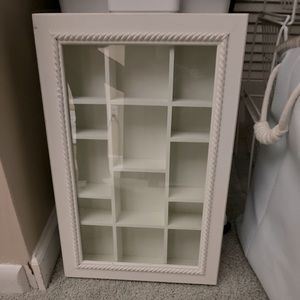 Display case,jewelry box,trinket keeper. Hang on wall or place on table.